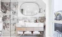 a bathroom with a sink and a mirror at Grand Hôtel Du Palais Royal in Paris