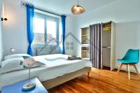 Łóżko lub łóżka w pokoju w obiekcie LocaLise - M8 - Ty Geoland - Maison à deux pas du centre avec jardin au Guilvinec - Wifi inclus - Animaux bienvenus- Linge de lit inclus