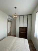 A bed or beds in a room at HomeStyle Agorà