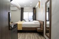 Posteľ alebo postele v izbe v ubytovaní Nikolaidis Apartments