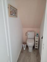 a small bathroom with a toilet in a attic at Gîte Évasion idyllique à l&#39;étage près zoo-chateaux in Faverolles-sur-Cher