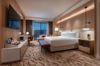 Ein Bett oder Betten in einem Zimmer der Unterkunft Durango Casino &amp; Resort