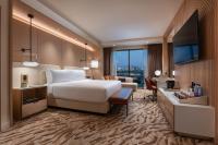 Ein Bett oder Betten in einem Zimmer der Unterkunft Durango Casino &amp; Resort