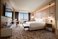 Ein Bett oder Betten in einem Zimmer der Unterkunft Durango Casino &amp; Resort