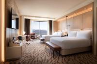 Ein Bett oder Betten in einem Zimmer der Unterkunft Durango Casino &amp; Resort