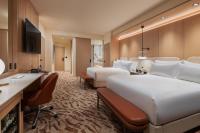 Ein Bett oder Betten in einem Zimmer der Unterkunft Durango Casino &amp; Resort