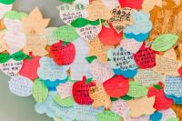 a wall of paper hearts with writing on it at 自由之丘民宿 l 寵物友善 in Taitung City