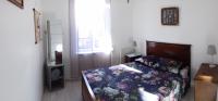 Łóżko lub łóżka w pokoju w obiekcie Gîte Escale en vue - 3 Chambres - 150 m de la plage -