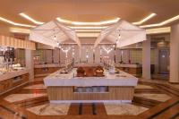 a large room with a buffetasteryasteryasteryasteryasteryasteryasteryasteryasteryastery at Calimera Blend Paradise in Hurghada