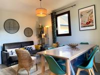 a living room with a dining room table and chairs at Appartement Annecy, 3 pièces, 6 personnes - FR-1-432-4 in Annecy