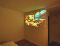 SG ROOMSにあるテレビまたはエンターテインメントセンター