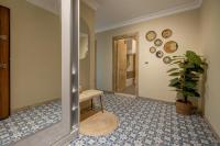 A bed or beds in a room at Gurel Garden House