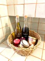 two bottles of wine in a basket on a counter at L&#39;Annexe de la Madrague Marseille in Marseille
