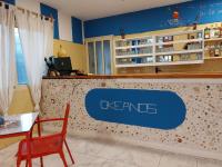 a knees sign on the counter of a pharmacy at OKEANOS in Sal Rei