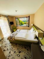 Posteľ alebo postele v izbe v ubytovaní Hotel Pruggererhof