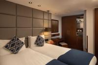 Montcalm Chilworth Townhouse, Paddingtonにあるベッド