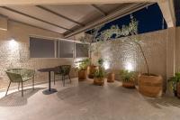 TV a/nebo společenská místnost v ubytování Oliva Plaza Hotel