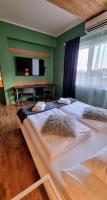 Posteľ alebo postele v izbe v ubytovaní Boutique Hotel & Event Center