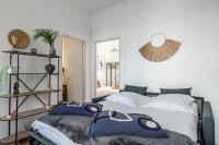 Posteľ alebo postele v izbe v ubytovaní Résidence Palais des Festivals - Cannes centre