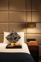 Montcalm Chilworth Townhouse, Paddingtonにあるベッド