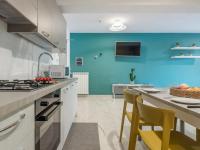 Kuchyňa alebo kuchynka v ubytovaní Azzurra Apartments