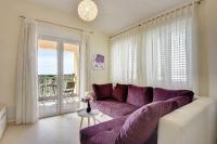 Posedenie v ubytovaní Modernes Appartement mit Balkon, BBQ, WLAN, Klima