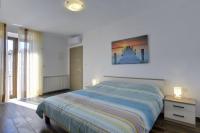 Posteľ alebo postele v izbe v ubytovaní Top Villa mit privatem Pool nur 1 km bis zum Strand mit Klima, WLAN, Sonnenliegen, Grill