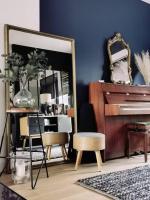 a living room with a mirror and a piano at Standing, calm &amp; confort. in Bègles
