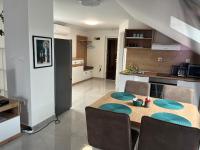 Kuchyňa alebo kuchynka v ubytovaní Apartments Puntamika
