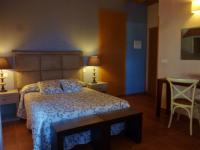 Łóżko lub łóżka w pokoju w obiekcie Hotel rural Los Manzanos