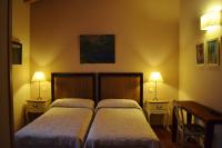 Łóżko lub łóżka w pokoju w obiekcie Hotel rural Los Manzanos