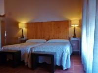 Łóżko lub łóżka w pokoju w obiekcie Hotel rural Los Manzanos