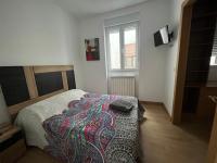 A bed or beds in a room at Alba Renueva 6