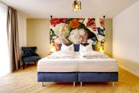 Hotel Lipmann "Am Klosterberg"にあるベッド