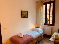 Posteľ alebo postele v izbe v ubytovaní Grimaldi Apartments Cannaregio