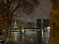 a view of the eiffel tower at night at Appartement vue Tour Eiffel paris 16 Eme in Paris