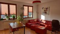 Posedenie v ubytovaní Bobrovia Apartment