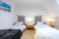 Cama o camas de una habitaci&oacute;n en Appartement 100m2 Vilvic vue mer
