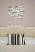 A bed or beds in a room at Hotel Roxy & Beach