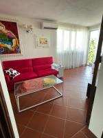 A seating area at VILLA ISELLA