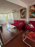 A seating area at VILLA ISELLA