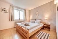 Łóżko lub łóżka w pokoju w obiekcie Bungalow Nr. 33 - Die Ferienwohnung