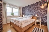 Łóżko lub łóżka w pokoju w obiekcie Bungalow Nr. 33 - Die Ferienwohnung