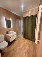 a bathroom with a shower and a toilet and a sink at HAVRE DE PAIX LES PIEDS DANS L&#39;EAU in Istres