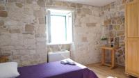 Posteľ alebo postele v izbe v ubytovaní Guest house Jere Old Town