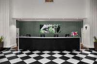 a meeting room with a black and white checkered floor at DoubleTree by Hilton Chicago O'Hare Airport-Rosemont in Rosemont