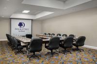 a conference room with a long table and chairs at DoubleTree by Hilton Chicago O'Hare Airport-Rosemont in Rosemont