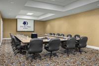 a conference room with a long table and chairs at DoubleTree by Hilton Chicago O'Hare Airport-Rosemont in Rosemont