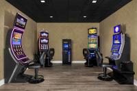 a group of video game machines in a room at DoubleTree by Hilton Chicago O'Hare Airport-Rosemont in Rosemont