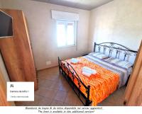 Posteľ alebo postele v izbe v ubytovaní Villa Sole - Villa Vacanze Indipendente & Climatizzata - Salento - Puglia - ITALY